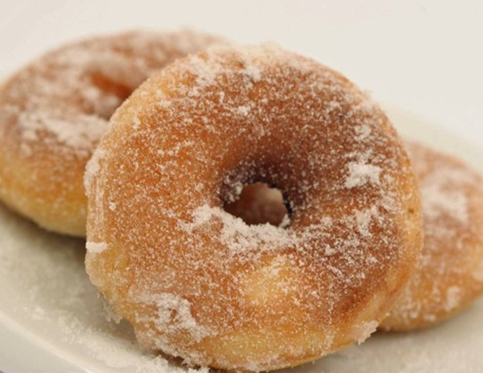 Donuts mit Zuckerglasur Donuts mit Zuckerglasur