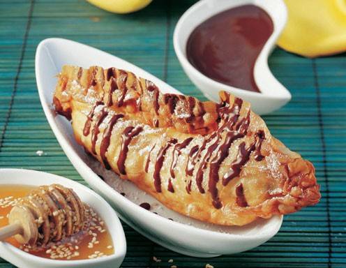 Bananen im Strudelteig mit Schokoladensauce Rezept - ichkoche.at