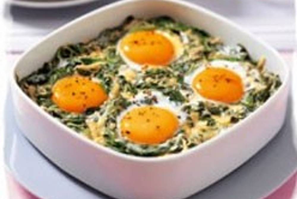 Versunkene Eier im Spinatnest Versunkene Eier im Spinatnest