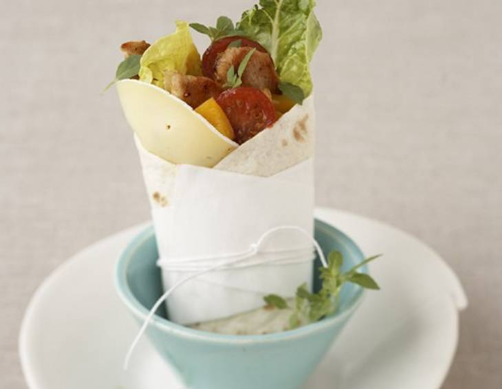 Wrap mit Bresso Weichkäse-Scheiben Wrap mit Bresso Weichkäse-Scheiben
