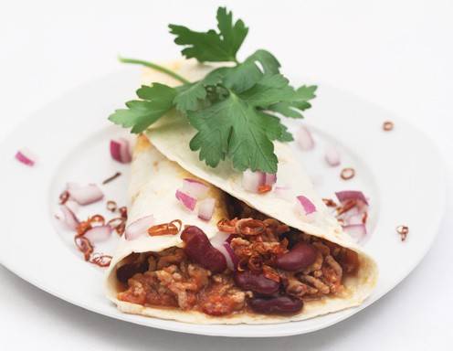 Tortillas mit feurigem Faschierten gefüllt