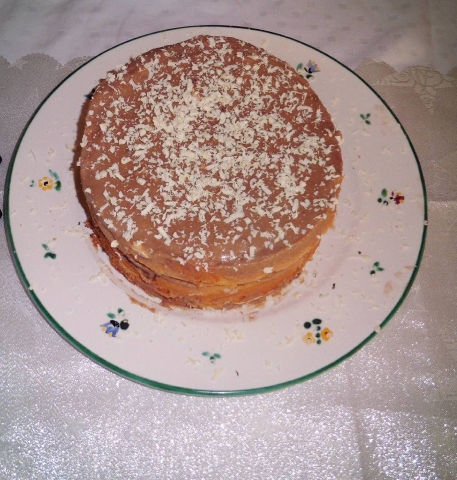 Biskuittorte mit Nougatcreme Rezept - ichkoche.de