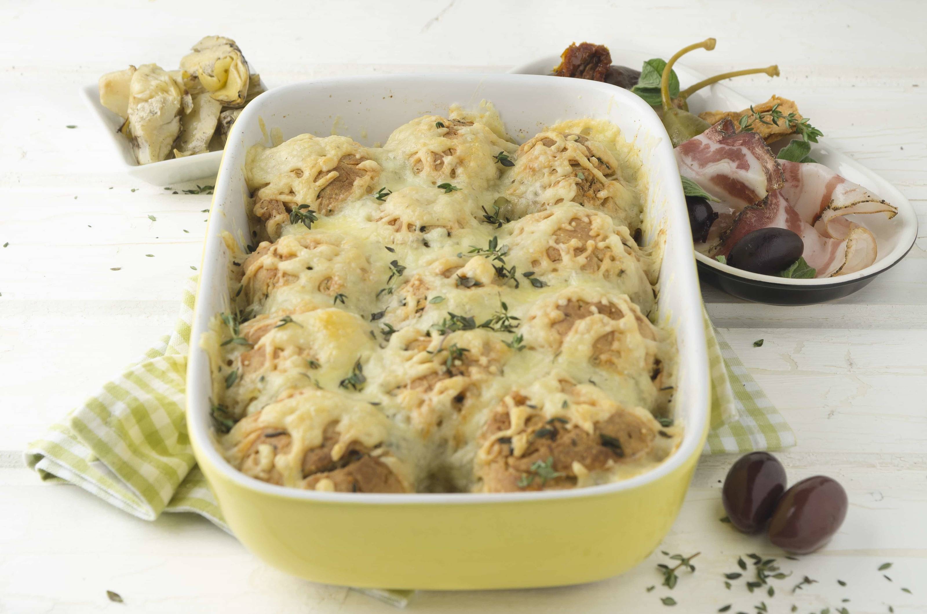 Parmesanbuchteln mit Antipasti und Pancetta Rezept