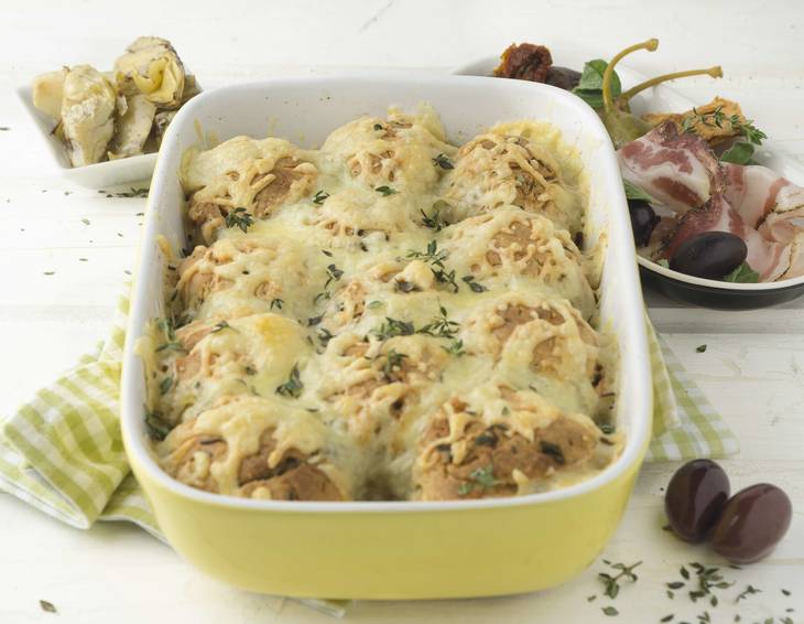 Parmesanbuchteln mit Antipasti und Pancetta Parmesanbuchteln mit Antipasti und Pancetta