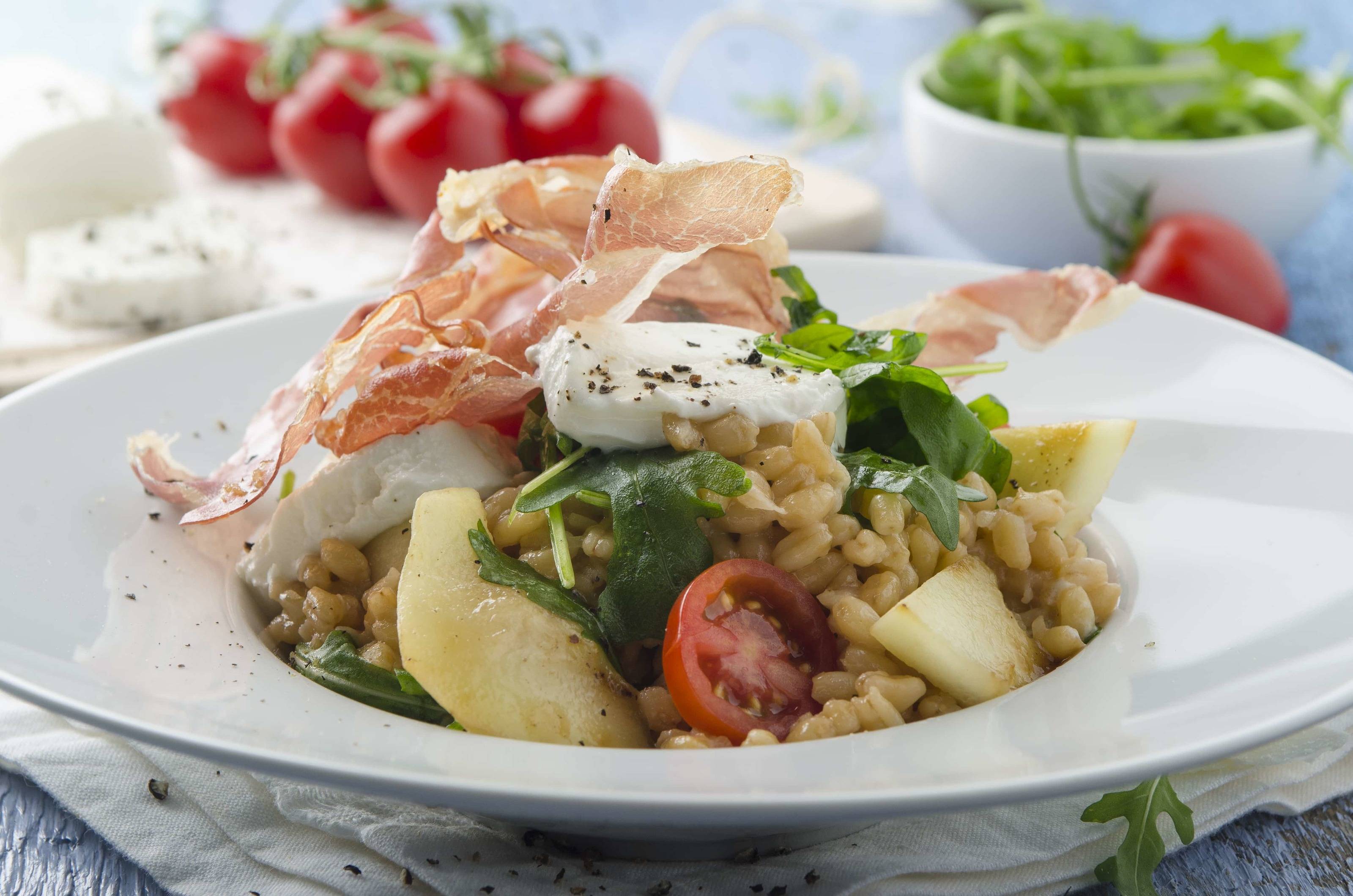 Ziegenkäse-Eblysotto mit Honigmelone und Prosciutto Rezept