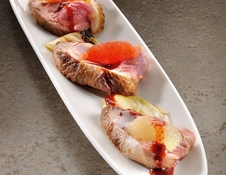Entenbrust mit Zitrusfrüchten, Chicorée und Vinaigrette Entenbrust mit Zitrusfrüchten, Chicorée und Vinaigrette