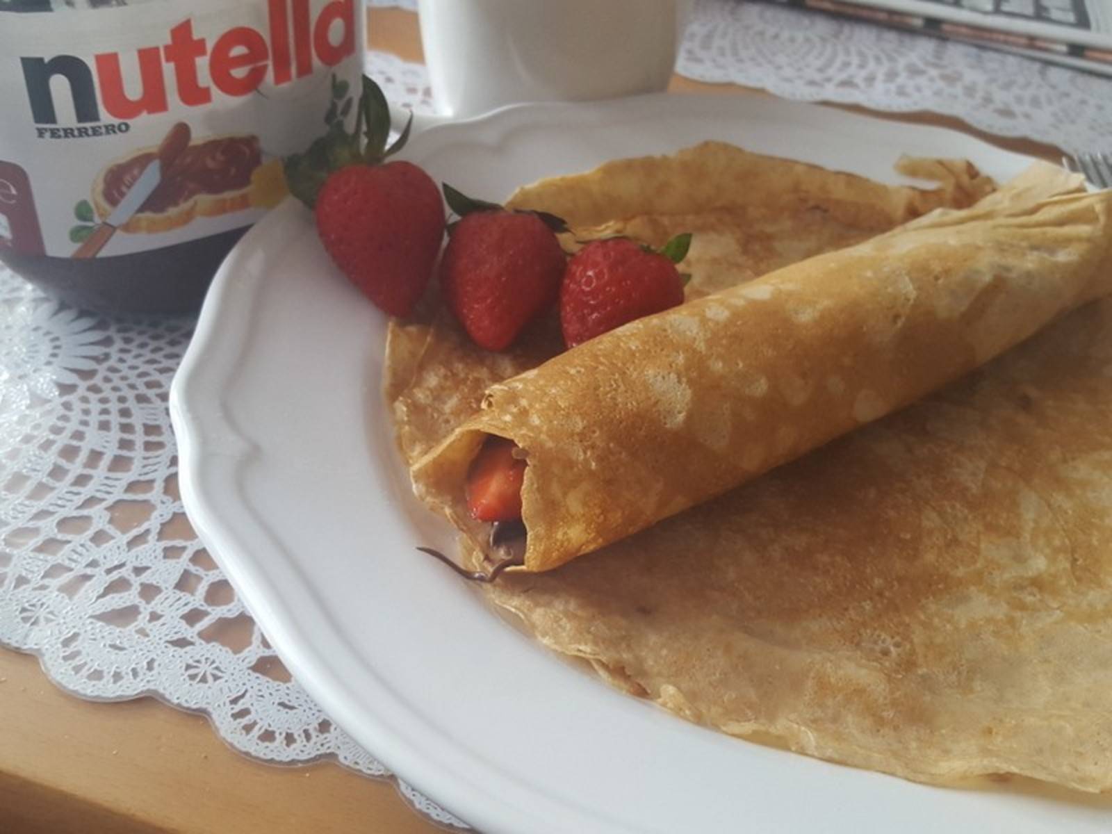 Dinkelpalatschinken mit Nutella und Erdbeeren Rezept - ichkoche.at