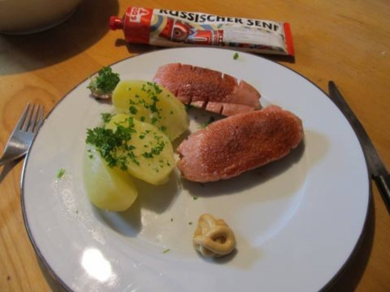 Knacker mit Petersilkartoffeln aus dem Druckkochtopf Rezept - ichkoche.de