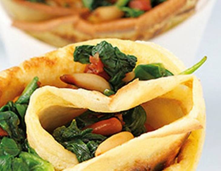 Spinat-Palatschinken gerollt Spinat-Palatschinken gerollt