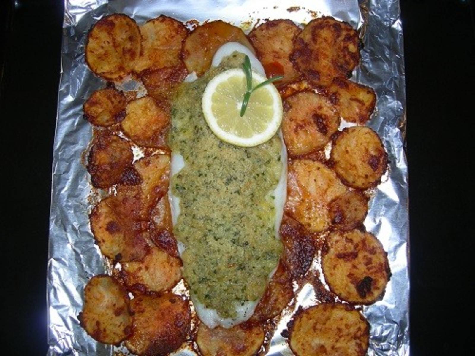 Pangasiusfilet mit Spinat-Schafkäse-Haube Rezept - ichkoche.de Pangasiusfilet mit Spinat-Schafkäse-Haube Rezept - ichkoche.de