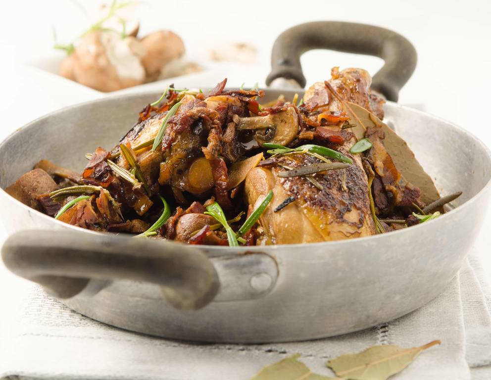 Hühnerkeulen mit Champignons Hühnerkeulen mit Champignons