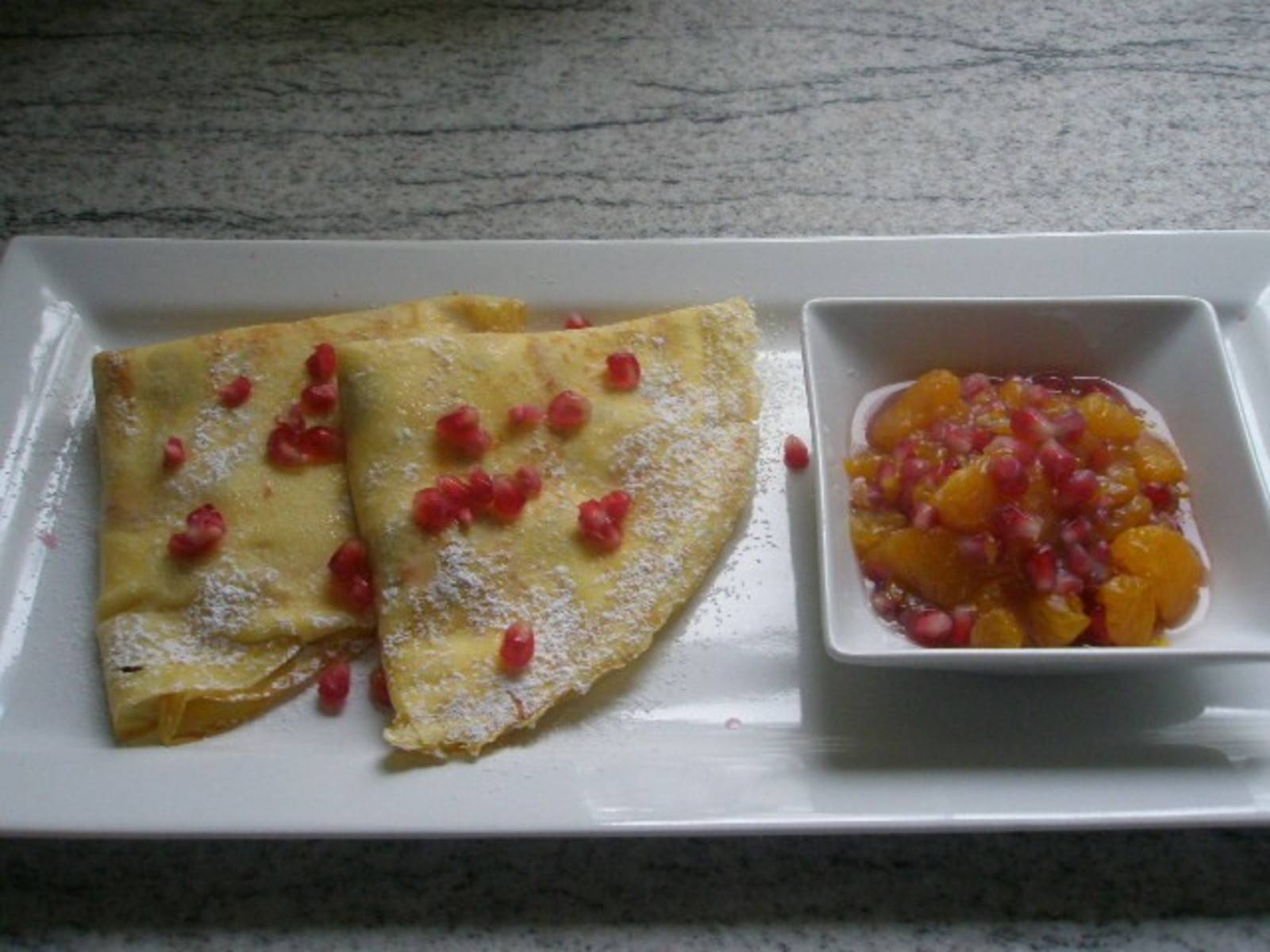 Honig Crepes mit Mandarinen-Granatapfelkompott