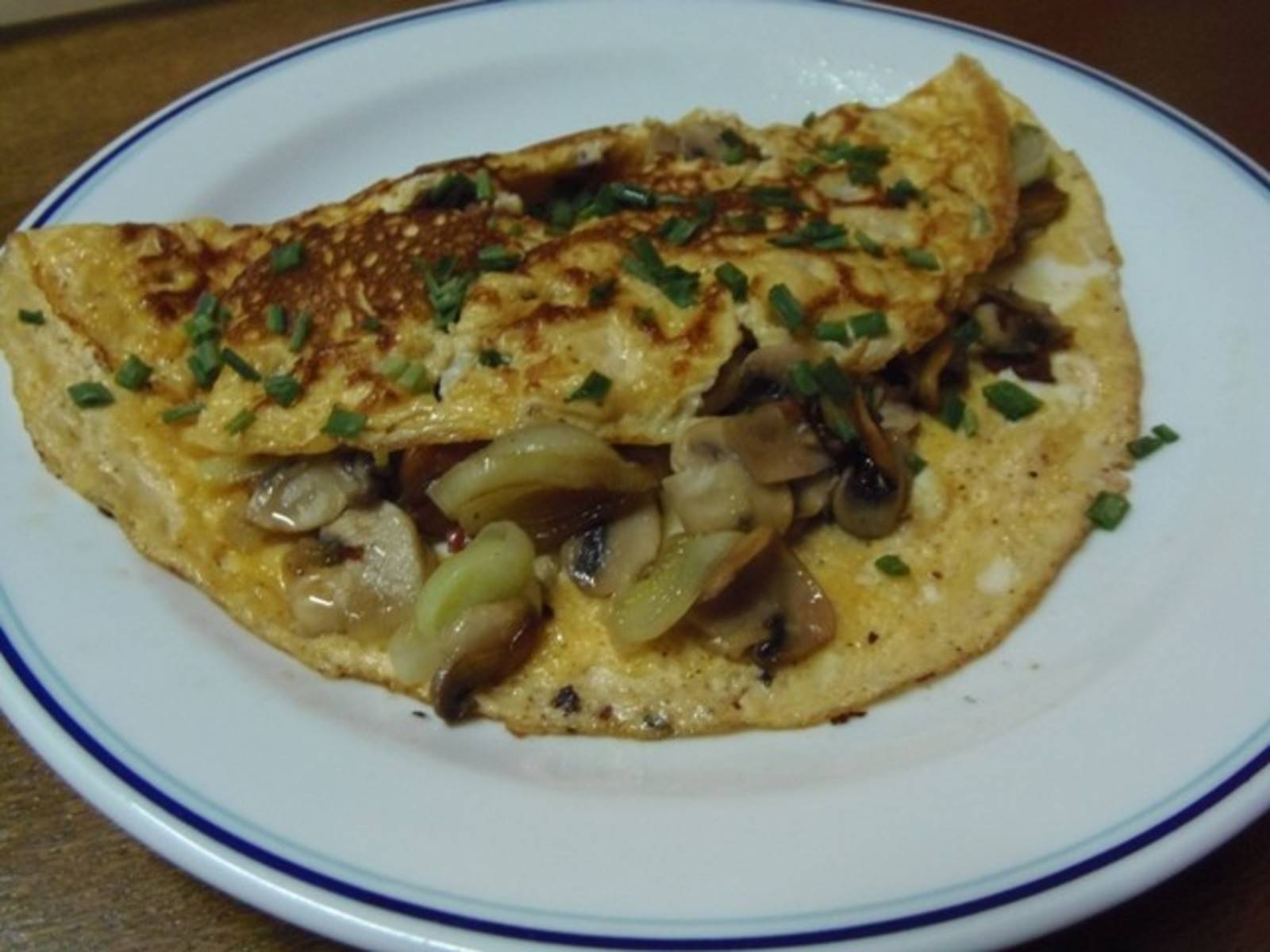 Champignon-Omelette mit Speck