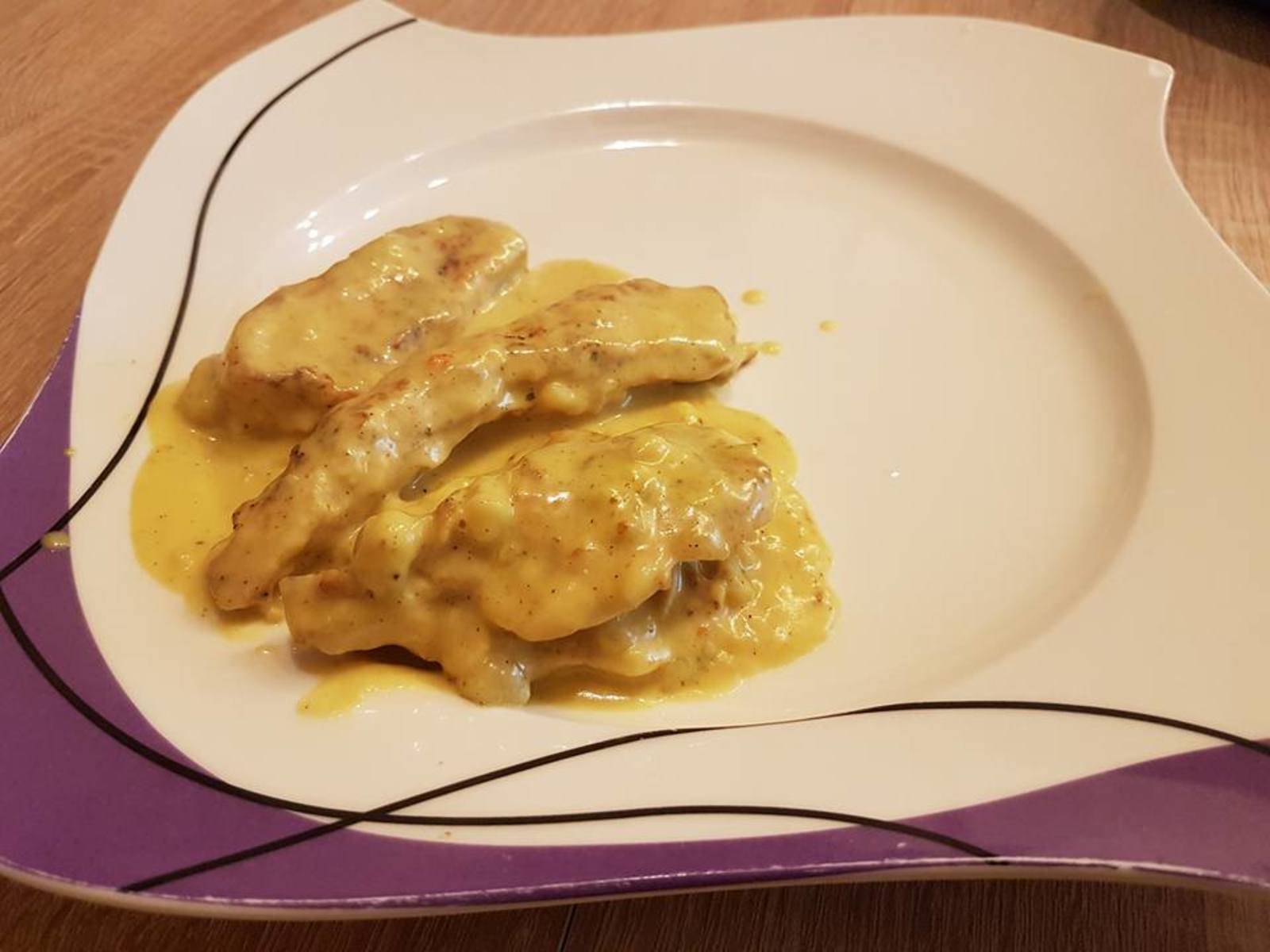 Gebratenes Putenfilet in Currysauce
