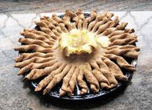 Brotsonne mit Käsevulkan Brotsonne mit Käsevulkan