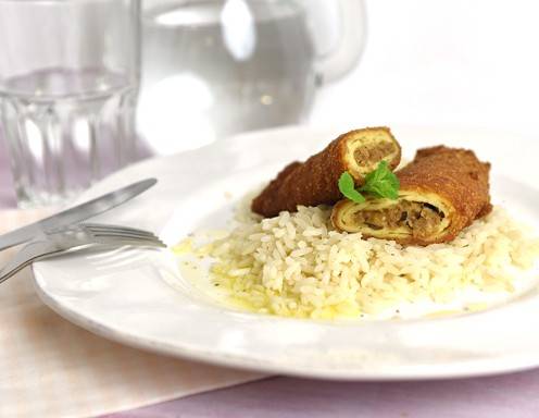 Gebackene Fleischpalatschinken mit Reis Rezept