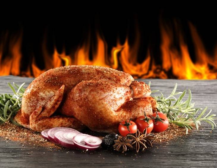 Gegrillte Gans am Spieß Gegrillte Gans am Spieß