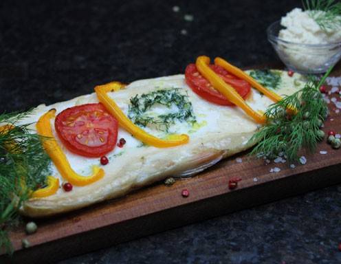 Gegrillter Fisch auf der Holzplanke Rezept