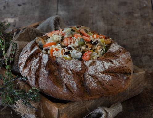 Fischeintopf im Brotlaib Rezept