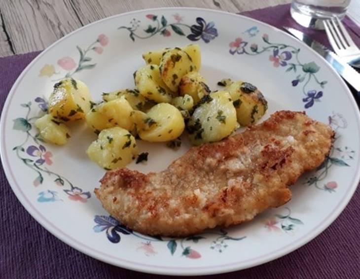 Schweinsschnitzel in Parmesanhülle