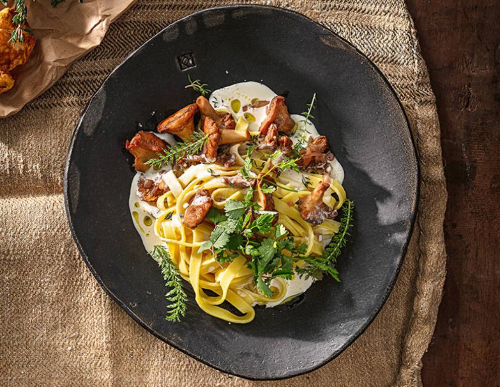 Pfifferlingsnudeln mit frischem Thymian in Weißwein-Sahne-Sauce