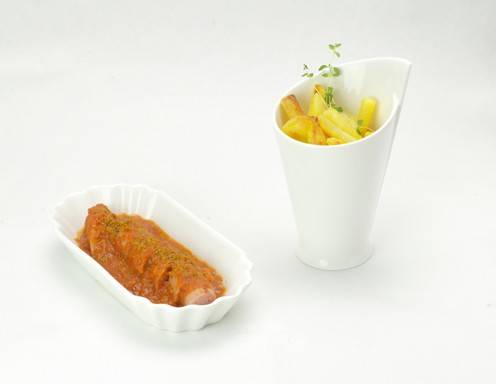 Rezept für Currywurst mit karibischen Geschmack und handgeschnittenen Pommes