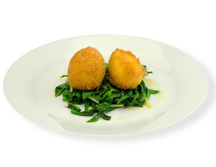 Gebackenes Ei mit gebratenem Bärlauch Gebackenes Ei mit gebratenem Bärlauch