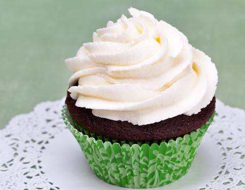 <p>Cupcake mit sch&ouml;n aufgesprutztem Topping.</p>