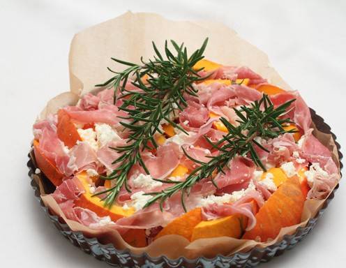 Kürbisspalten mit Prosciutto und Schafskäse Rezept