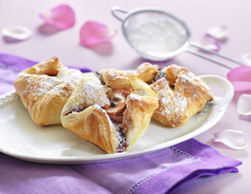 Teigtaschen mit Schokolade-Bananencreme gefüllt Teigtaschen mit Schokolade-Bananencreme gefüllt