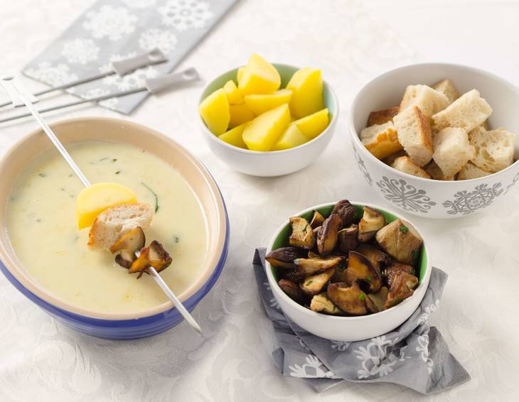 Gorgonzola-Rucola-Fondue mit Schwammerln Gorgonzola-Rucola-Fondue mit Schwammerln