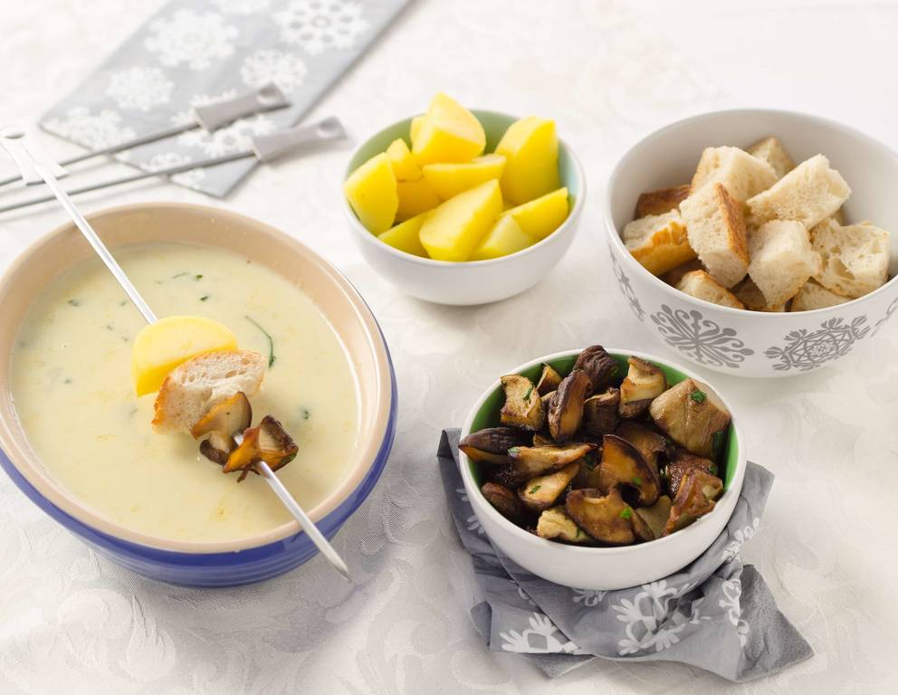 Gorgonzola-Rucola-Fondue mit Schwammerln Gorgonzola-Rucola-Fondue mit Schwammerln
