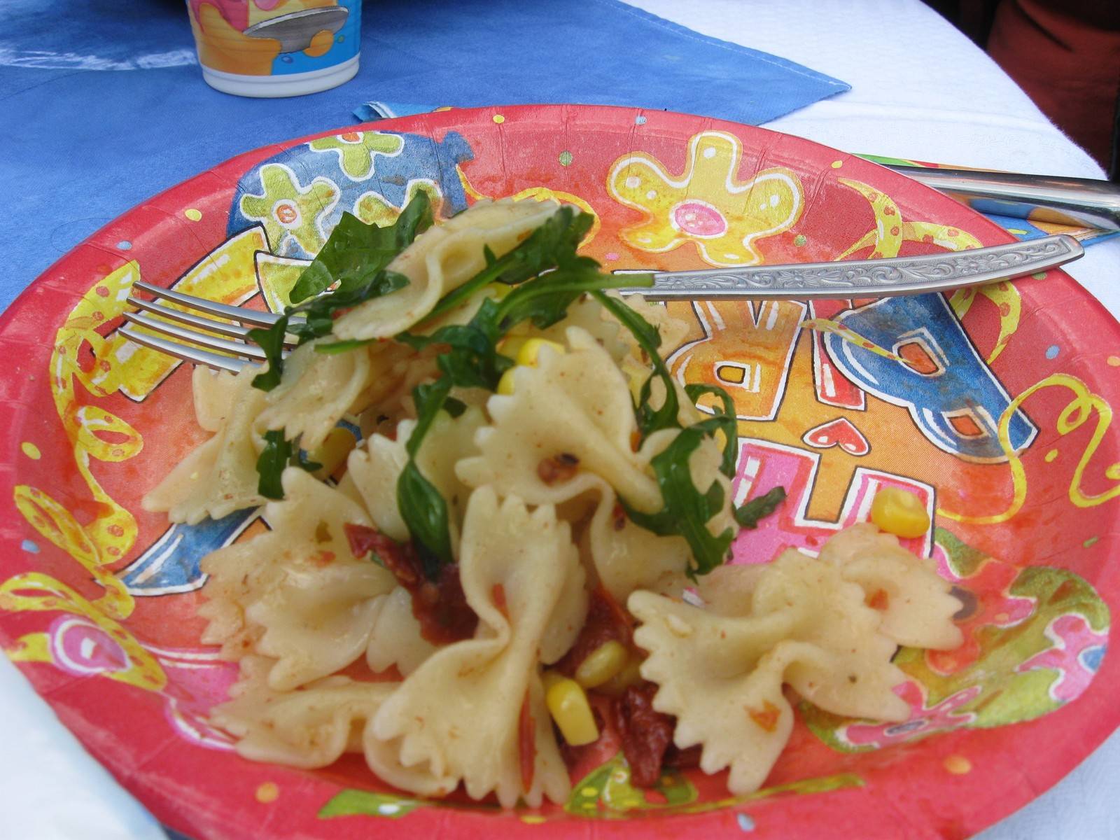 Farfalle con Pomodori Secchi e Rucola