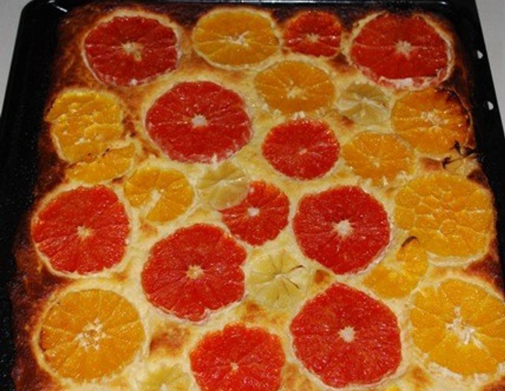 Topfenkuchen mit Zitrusfrüchten Topfenkuchen mit Zitrusfrüchten