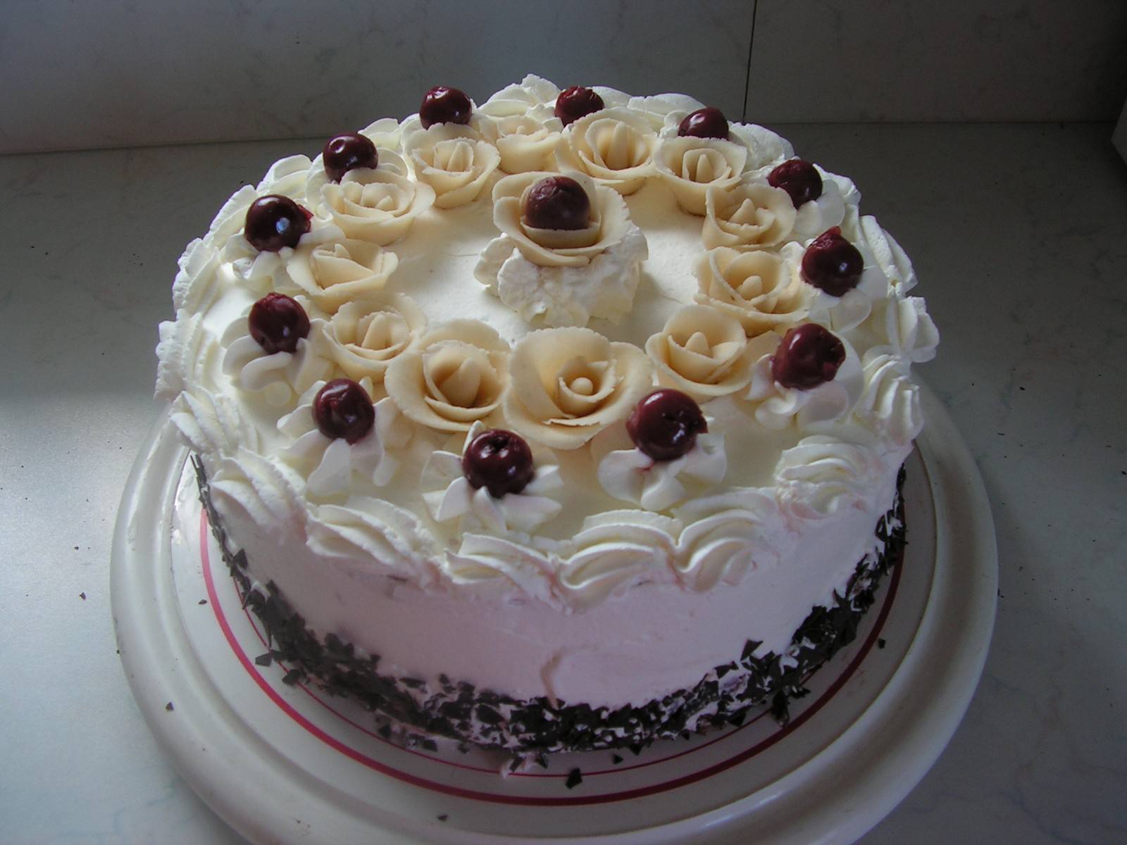 Biskuittorte mit Vanillecremefüllung Rezept - ichkoche.de Biskuittorte mit Vanillecremefüllung Rezept - ichkoche.de