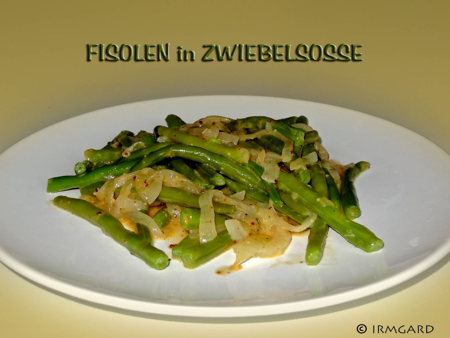 Fisolen in Zwiebelsauce