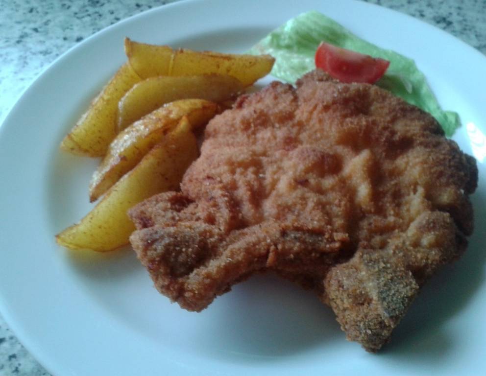 Schweinskotlettes gebacken Schweinskotlettes gebacken
