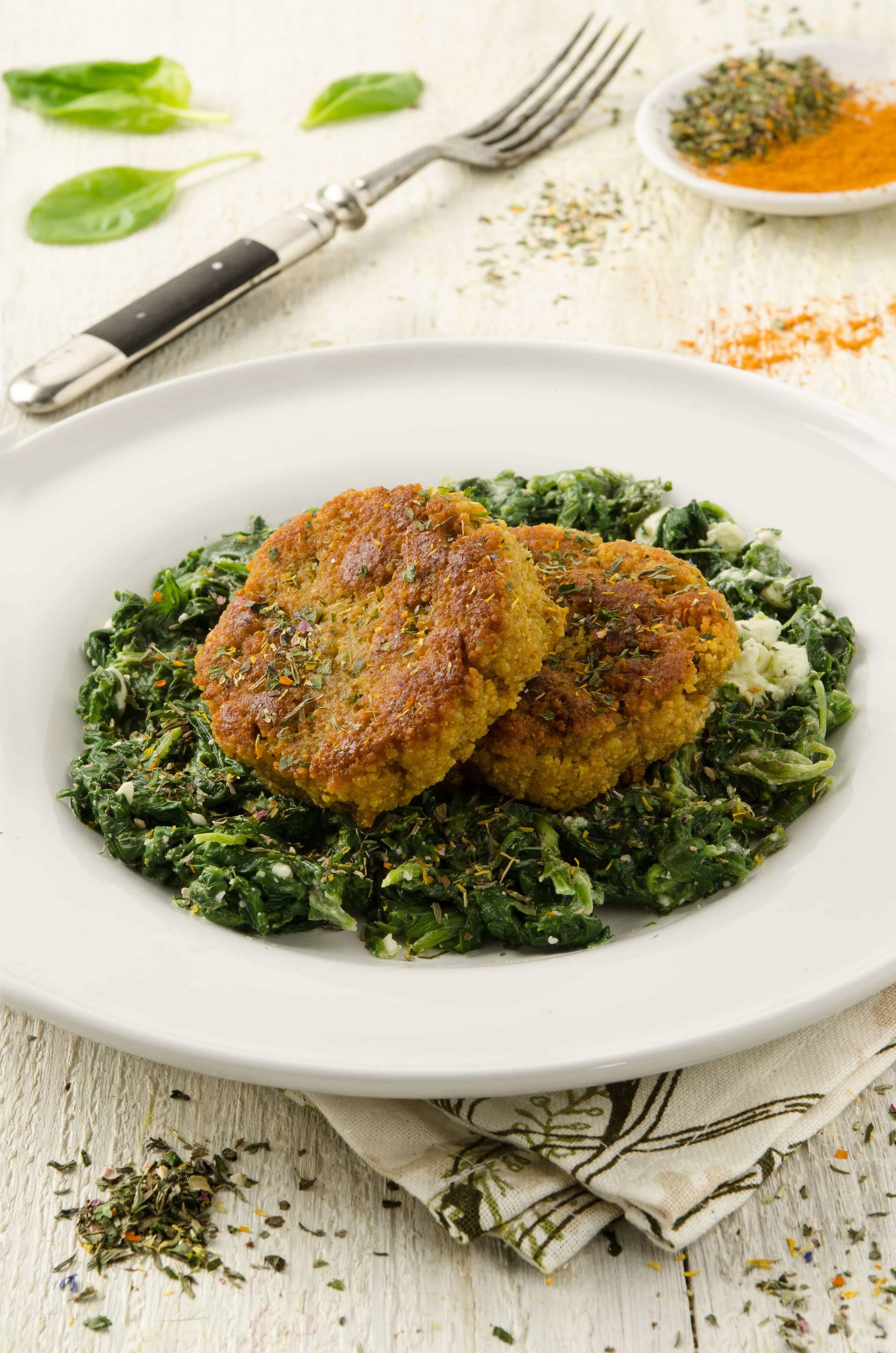 Cous-Cous-Laibchen auf Schafkäse-Spinat Rezept