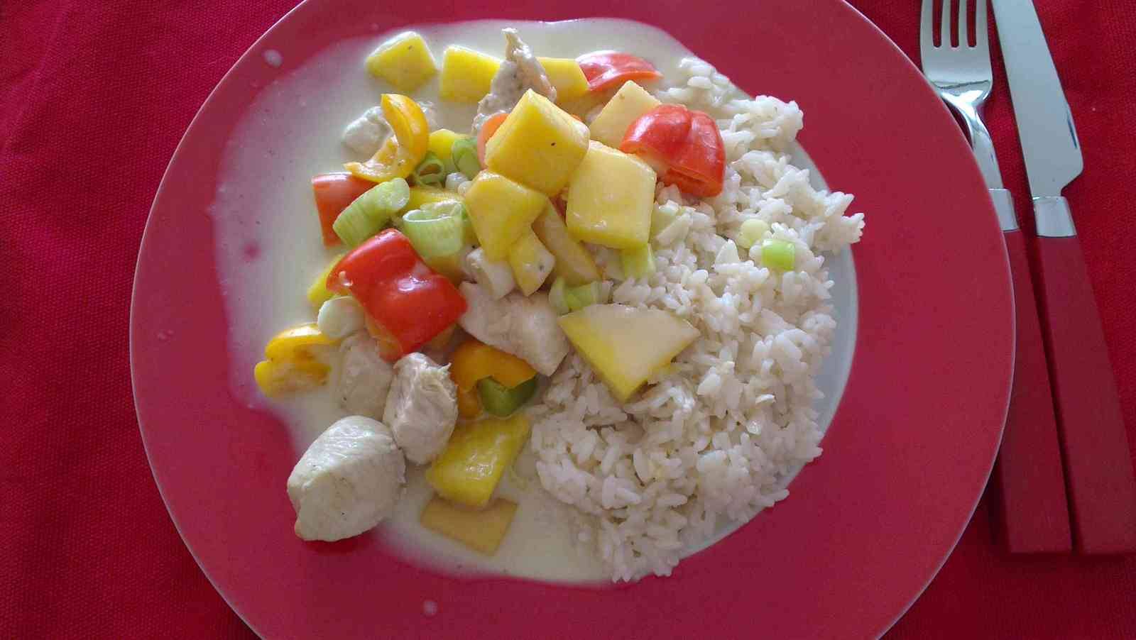 Putencurry mit Mango und Reis