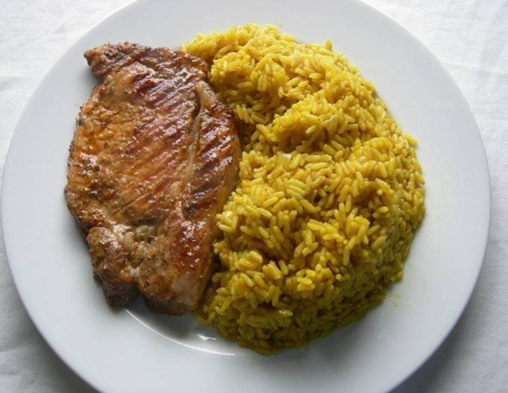 Naturschnitzel mit Curryreis auf Grossmutters Art Naturschnitzel mit Curryreis auf Grossmutters Art