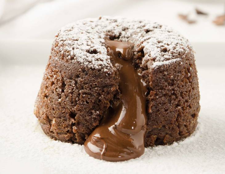 Flüssig gefülltes Schoko-Soufflé Flüssig gefülltes Schoko-Soufflé