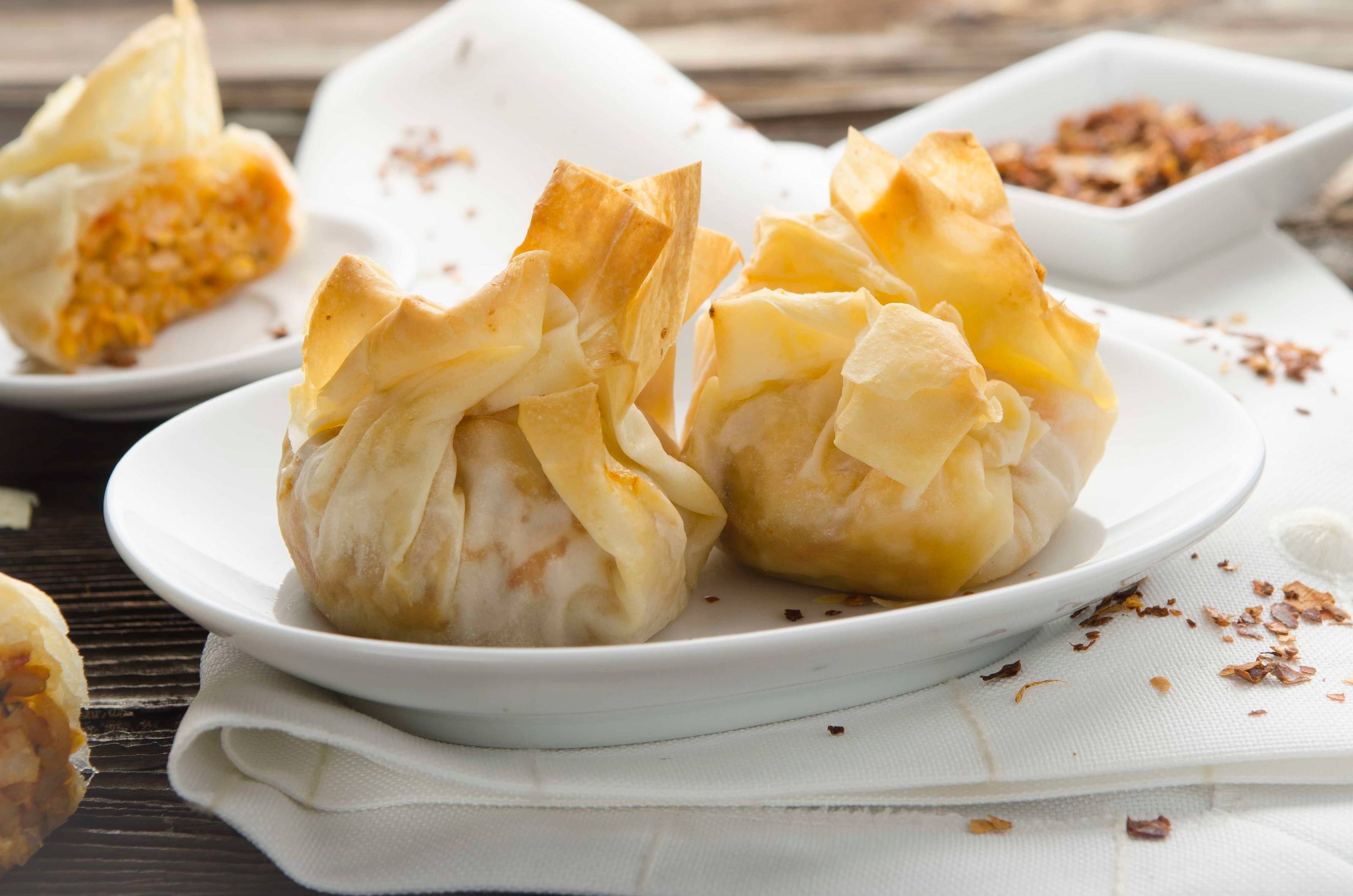 Strudelzuckerl mit Risotto und Garnelen Rezept