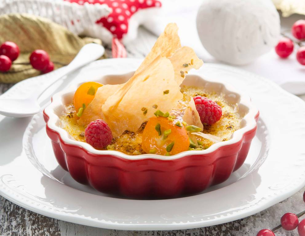Karamellcreme mit eingelegten Kumquats und Pistazien Karamellcreme mit eingelegten Kumquats und Pistazien