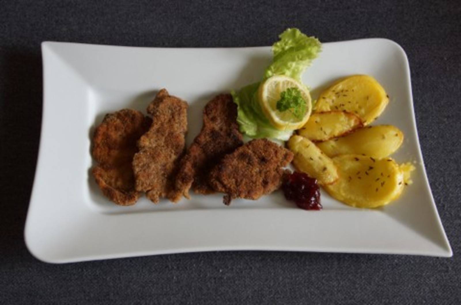 Filetschnitzerl mit Walnusspanier